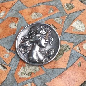 Antique Art nouveau sterling pin lady flowing hair